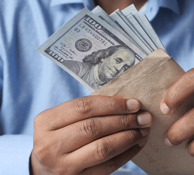 Person holding cash